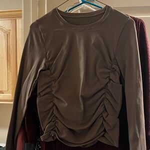 Tight Fit Long Sleeve Top in Pink, Black, Brown, and White.